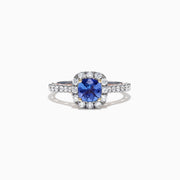 The Nahla Siri 14K Two Tone Gold Tanzanite & Diamond Ring, 1.45 TCW, features a cushion-cut tanzanite center surrounded by a diamond halo and more diamonds set along the band.