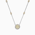 The Canare 14K Two-Tone Gold Yellow and White Diamond Station Necklace features a round pendant with clustered yellow and clear stones and yellow-accented settings along the chain.