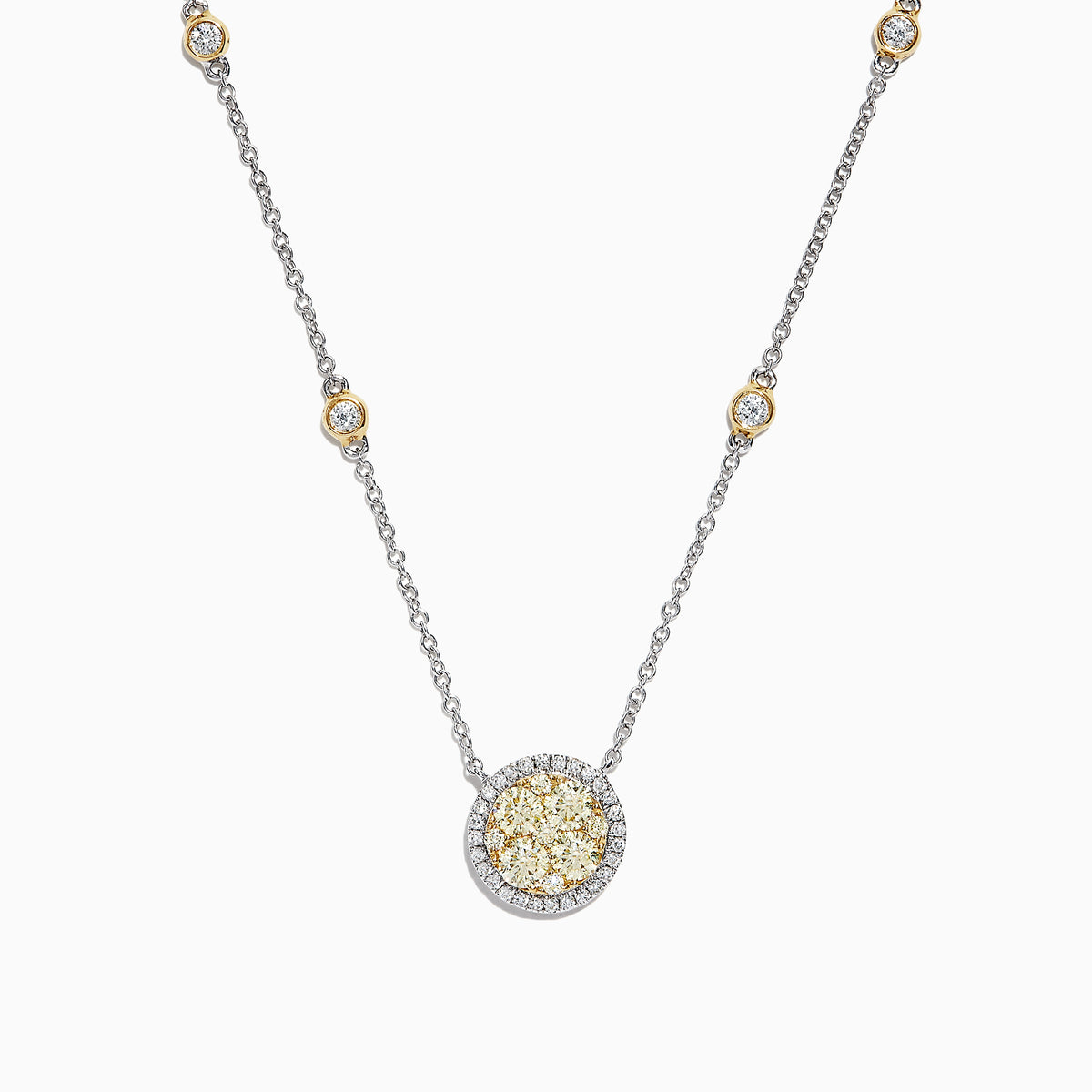 The Canare 14K Two-Tone Gold Yellow and White Diamond Station Necklace features a round pendant with clustered yellow and clear stones and yellow-accented settings along the chain.