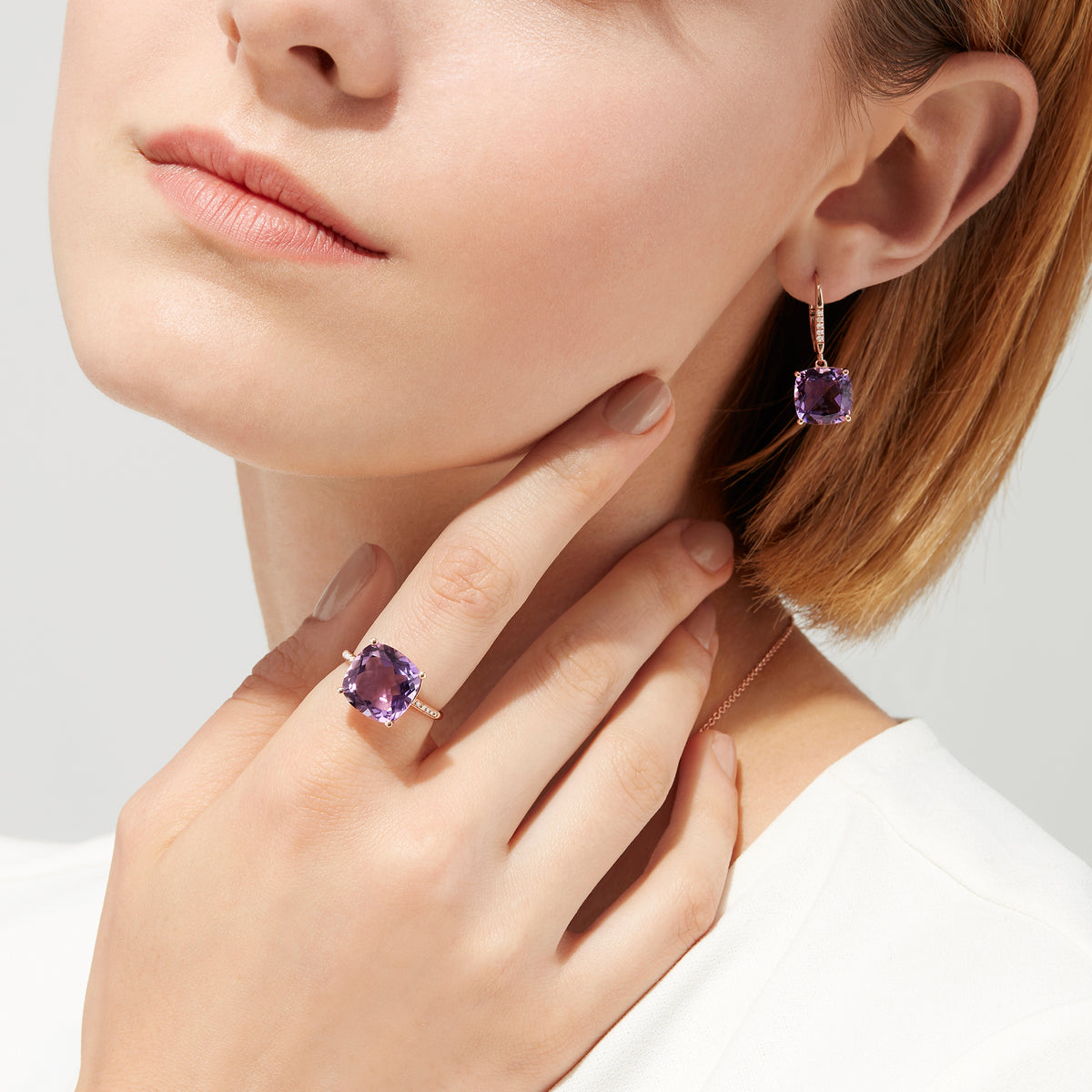 14K Rose Gold Amethyst and Diamond Earrings, 8.12 TCW, featuring cushion-cut amethysts and round diamonds set on the hooks, pictured against a white background.