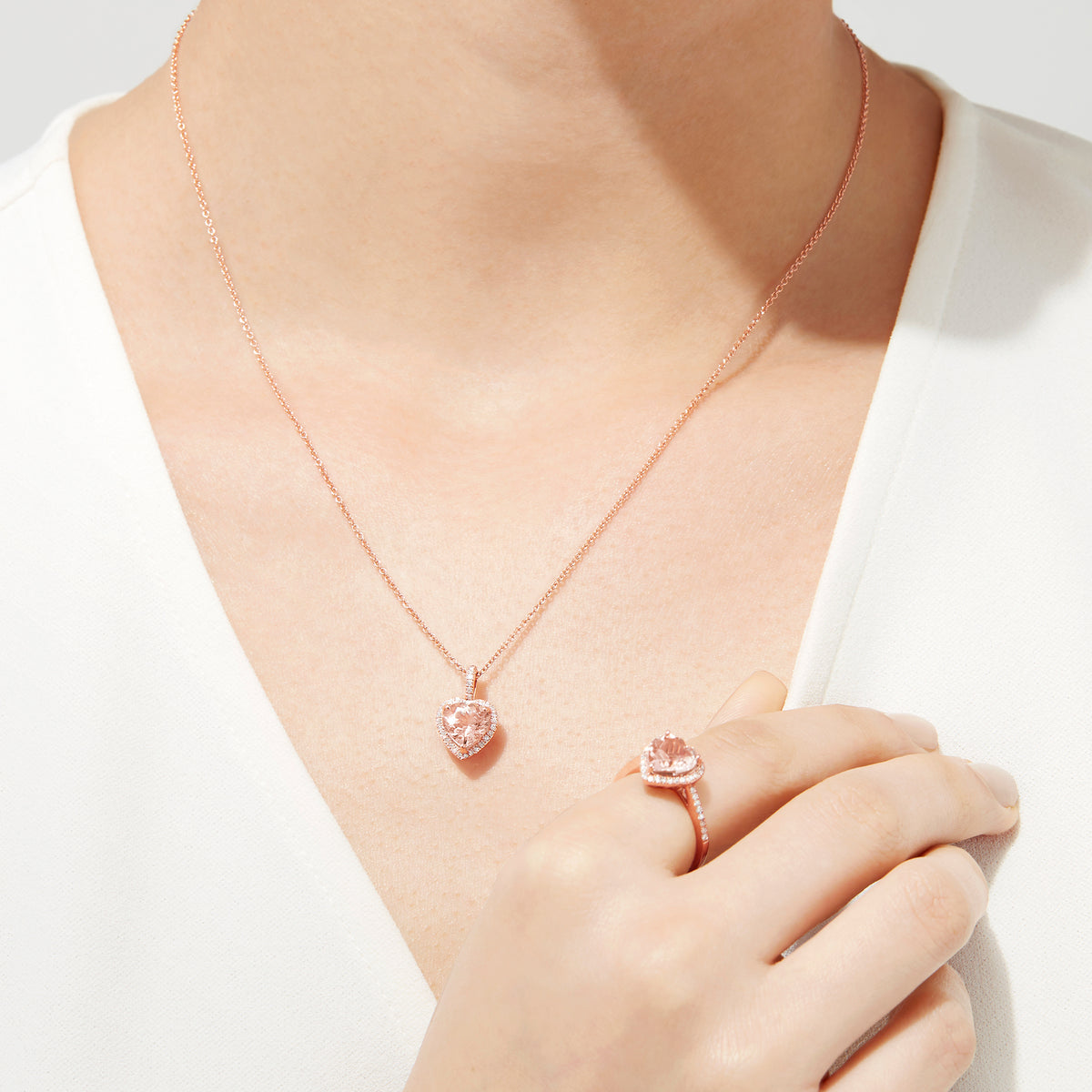 The Blush 14K Rose Gold Morganite and Diamond Heart Pendant (1.88 TCW) features a heart-shaped morganite surrounded by diamonds, shown on a simple white background.