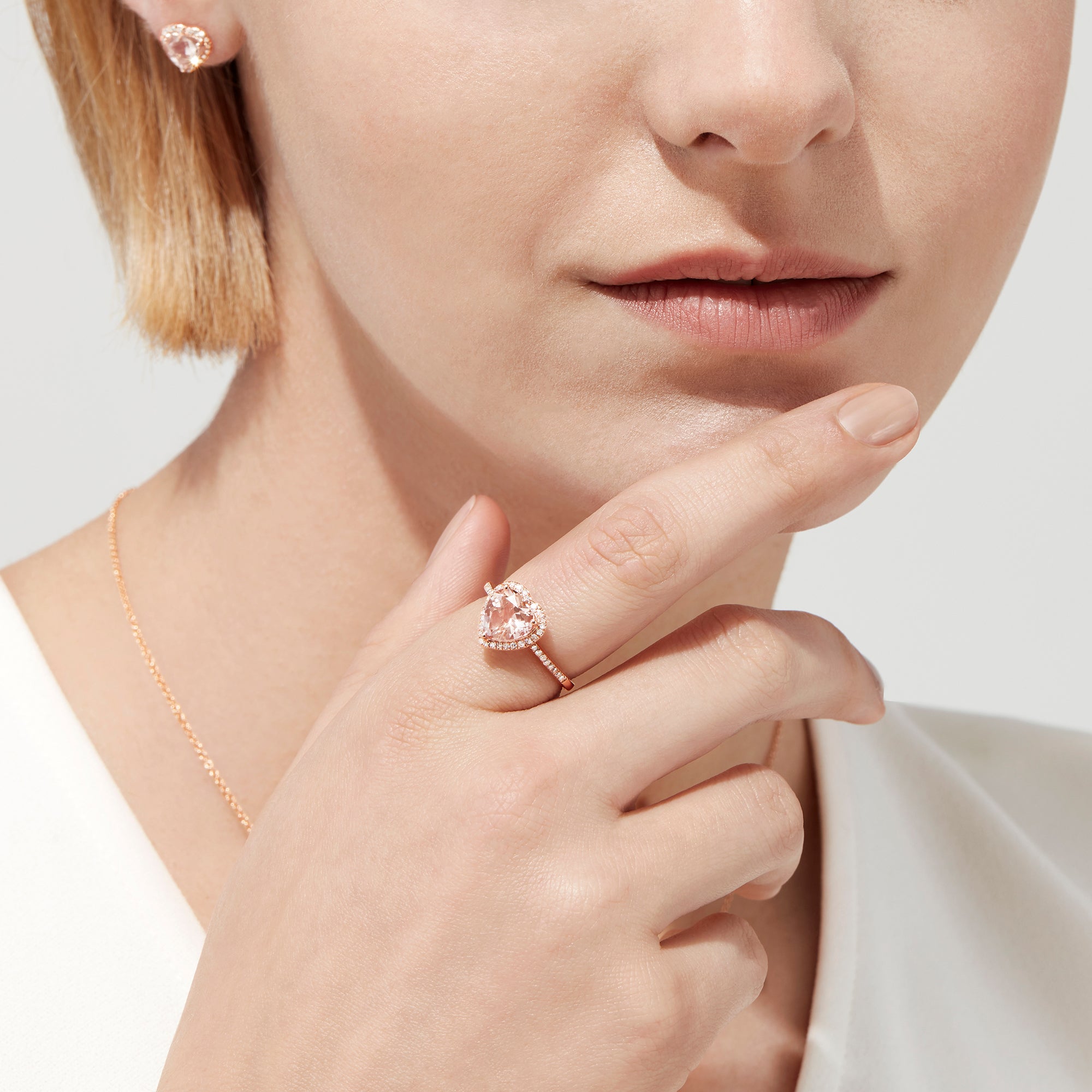 The Blush 14K Rose Gold Morganite and Diamond Heart Ring, 1.93 TCW features a heart-shaped pale pink morganite with a diamond halo and additional diamonds on the band.