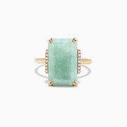 The 14K Yellow Gold Jade and Diamond Ring, 11.56 TCW, showcases a large rectangular jade center accented by sparkling round diamonds on each side, set against a white background.