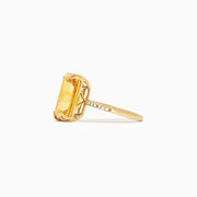 The Sunset 14K Yellow Gold Citrine and Diamond Ring, 6.72 TCW, features a large rectangular citrine center stone with small round diamonds set on a slim band, shown against a white background.