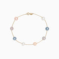 The 14K Yellow Gold Multi Color Cultured Pearl Bracelet features evenly spaced pink, white, lavender, grey, and blue pearls on a delicate gold chain with a small lobster clasp.