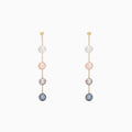 The 14K Yellow Gold Multi Color Cultured Pearl Earrings feature three vertically set cultured pearls in white, pink, and grey-blue hues on a delicate yellow gold chain, shown against a white background.