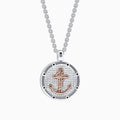The Mens Sterling Silver and 18K Rose Gold Plated Anchor Pendant features a round, textured silver design with a rose gold anchor at the center, hanging from a sleek silver chain—part of our mens jewelry collection.