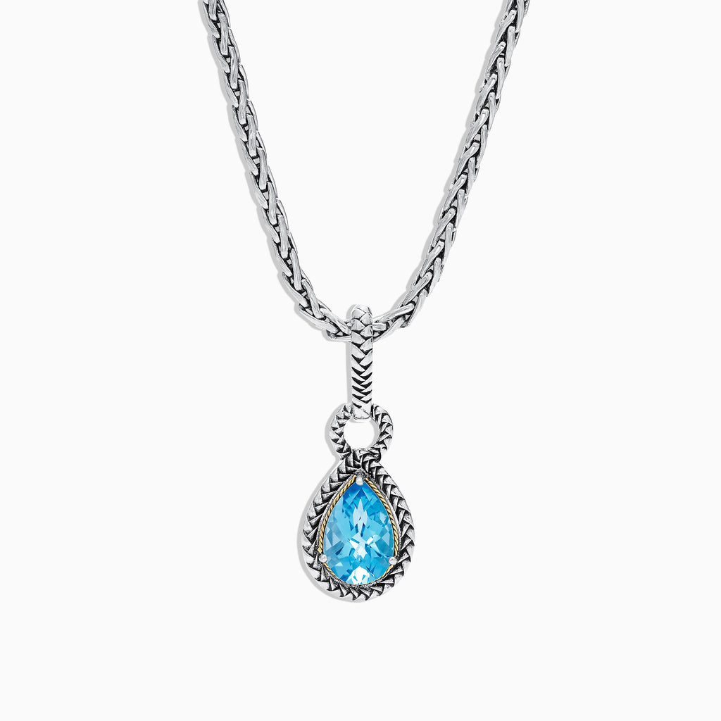 A 925 sterling silver and 18K yellow gold necklace showcasing a blue topaz pendant (3.14 TCW), elegantly framed in a twisted rope design.