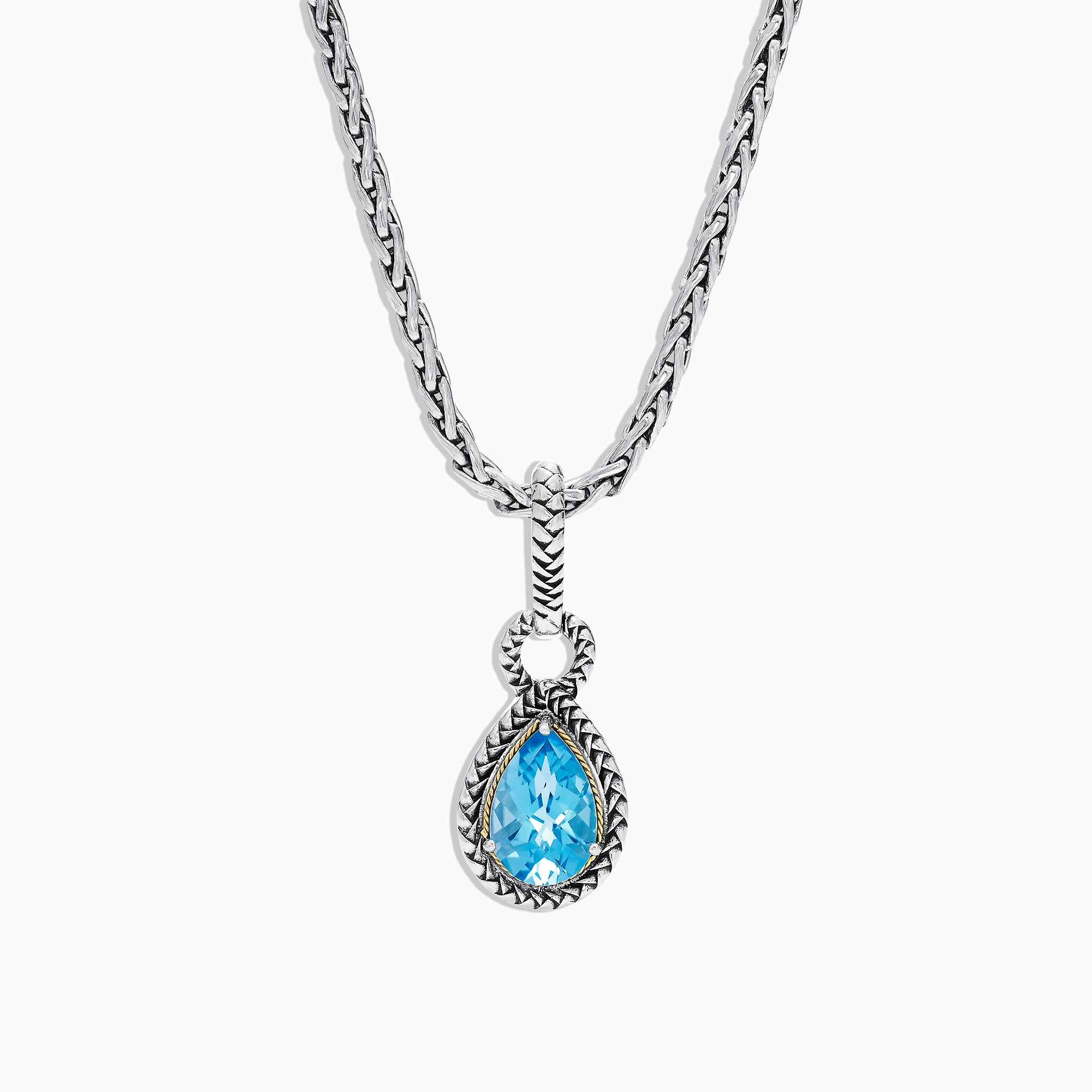 A 925 sterling silver and 18K yellow gold necklace showcasing a blue topaz pendant (3.14 TCW), elegantly framed in a twisted rope design.