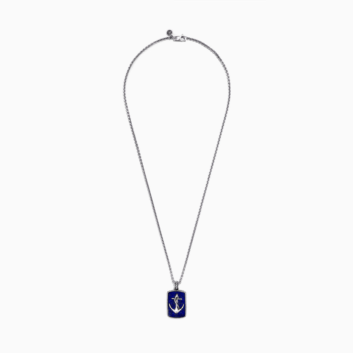 The Mens Sterling Silver Lapis Lazuli Anchor Dog Tag Pendant (18.85 TCW) features a silver anchor design set on deep blue lapis lazuli and is framed with a textured sterling silver border.