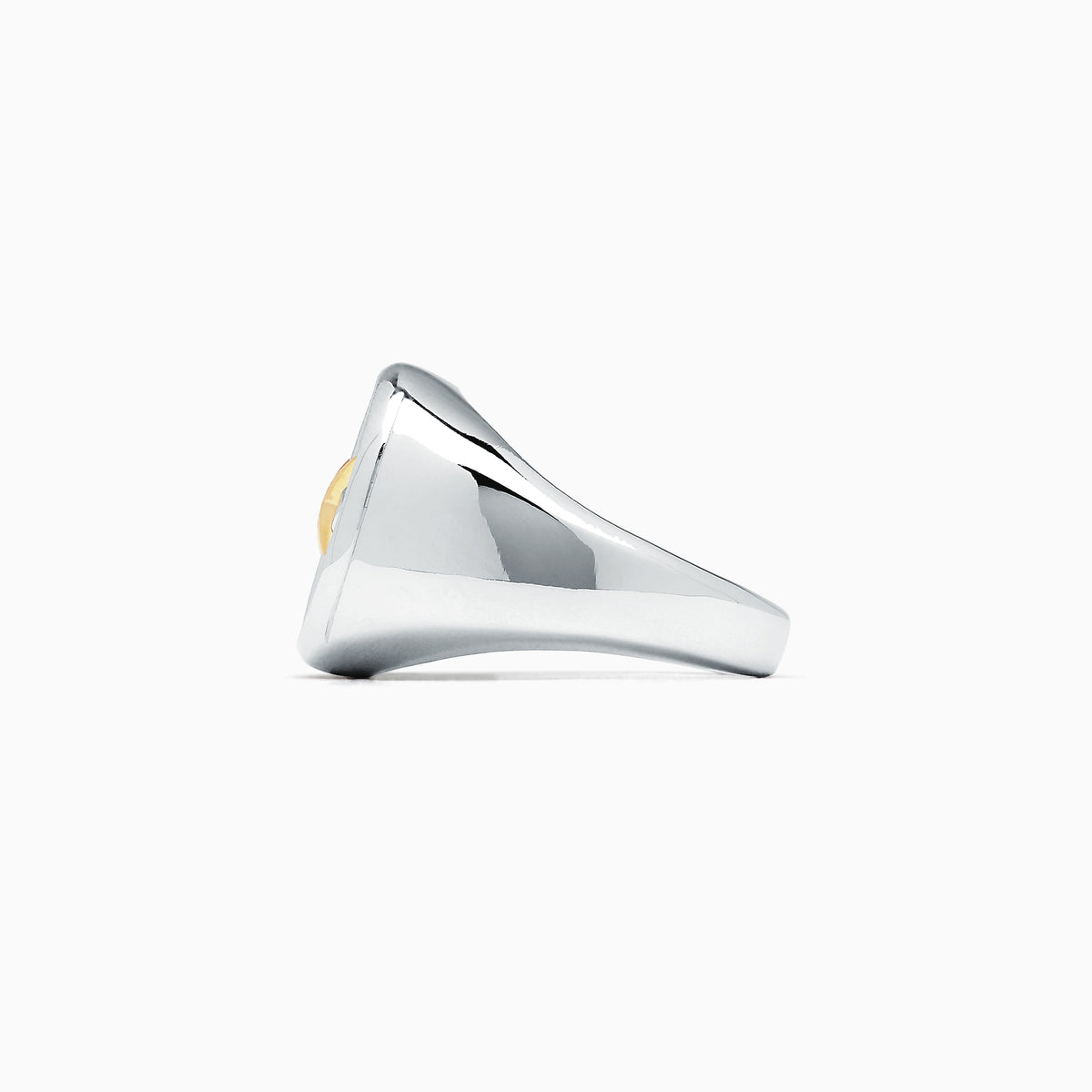 A mens sterling silver and 18K yellow gold ring features a gold star center, encircled by blue sapphires (0.75 TCW) in a striking pattern on top.