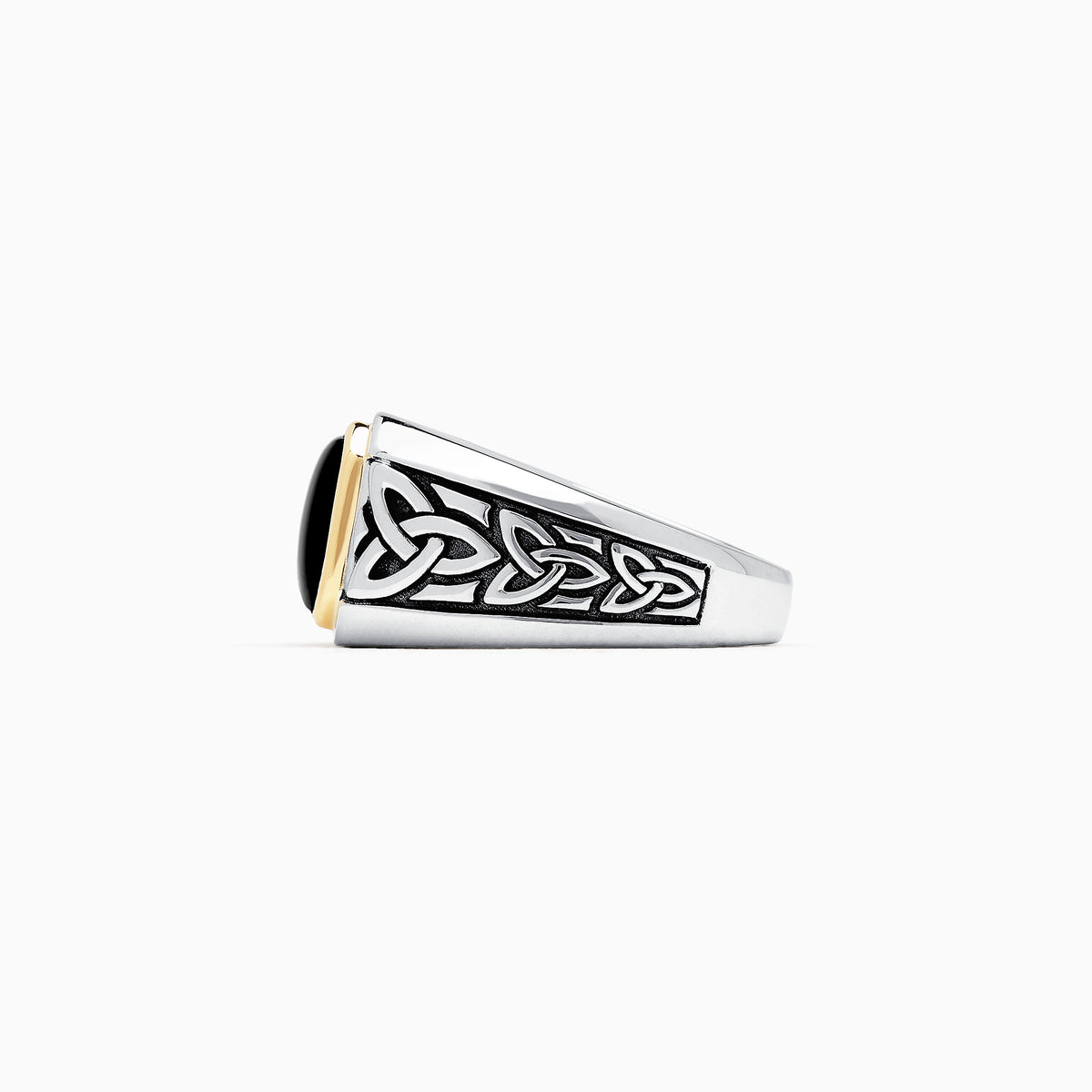 The Mens Sterling Silver and 14K Yellow Gold Onyx Ring, 3.40 TCW features a rectangular black onyx stone in a yellow gold bezel with detailed Celtic knot designs on the sides.