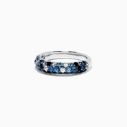 The 925 Sterling Silver Blue Sapphire Splash Ring, 1.80 TCW, features a band set with alternating light and dark blue gemstones, including blue sapphire, elegantly displayed on a plain white background.