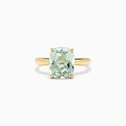 The 14K Yellow Gold Green Amethyst Ring features a 3.95 TCW rectangular cushion-cut gemstone set in a simple four-prong setting, shown against a white background.