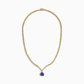 The Nahla Siri 14K Yellow Gold Tanzanite and Diamond Necklace (3.66 TCW) features a teardrop tanzanite pendant encircled by diamonds, with additional diamonds set along the chain for an elegant touch.