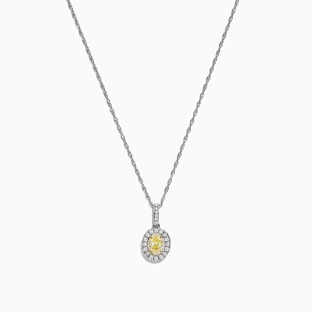 The Canare 18K Two-Tone Gold Oval Yellow Diamond Pendant (0.46 TCW) features a vivid yellow diamond encircled by sparkling stones, blending timeless elegance with modern design.