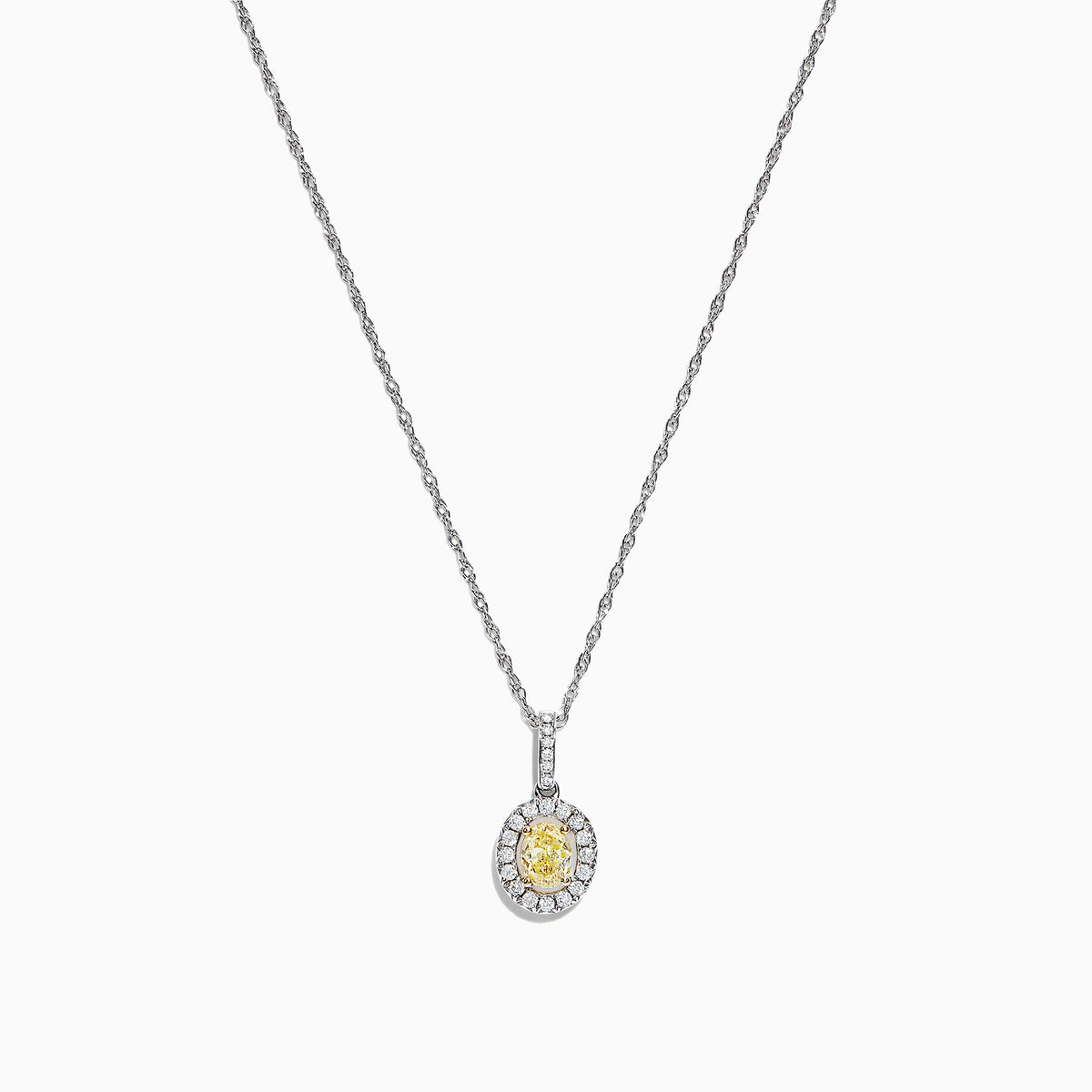 The Canare 18K Two-Tone Gold Oval Yellow Diamond Pendant (0.46 TCW) features a vivid yellow diamond encircled by sparkling stones, blending timeless elegance with modern design.
