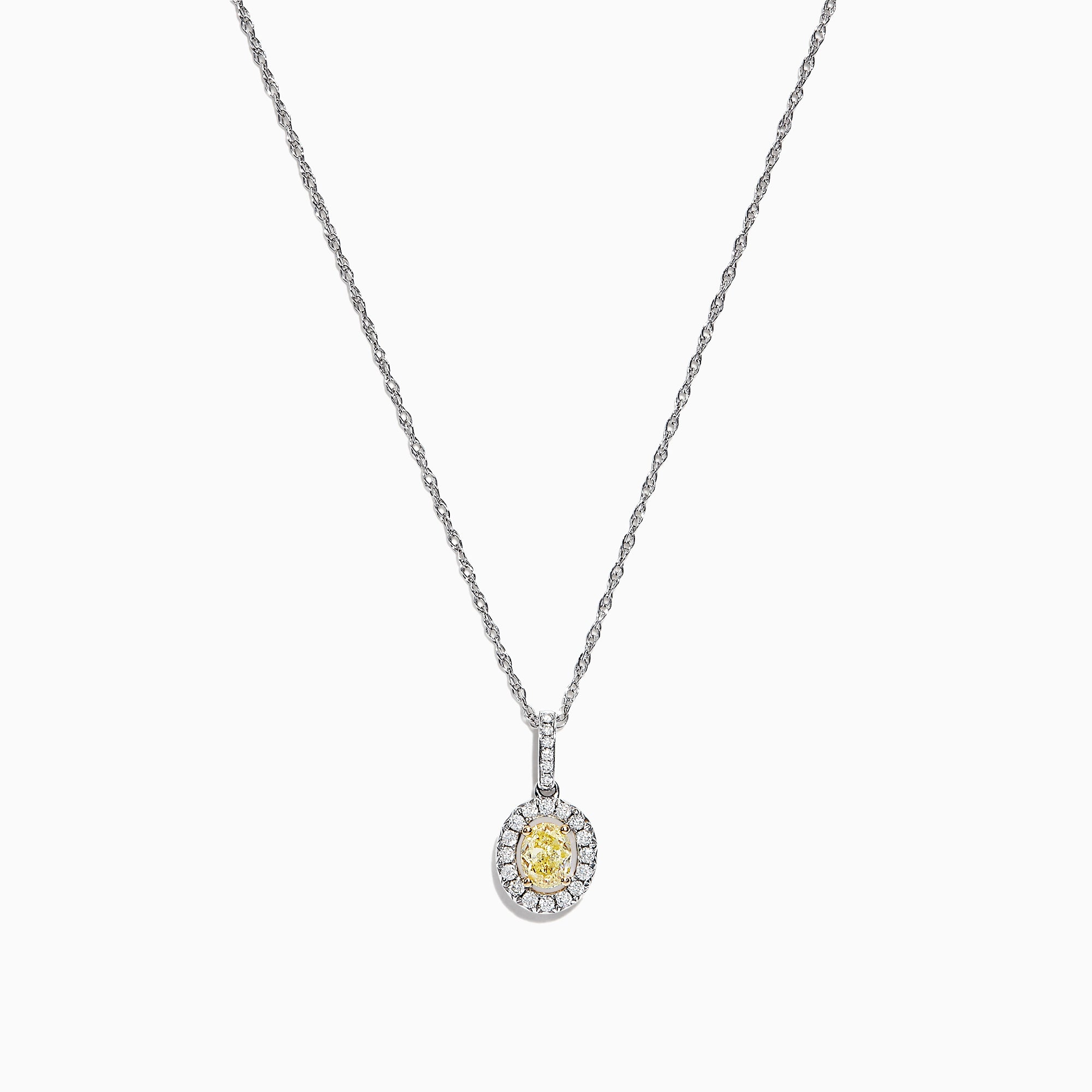 The Canare 18K Two-Tone Gold Oval Yellow Diamond Pendant (0.46 TCW) features a vivid yellow diamond encircled by sparkling stones, blending timeless elegance with modern design.