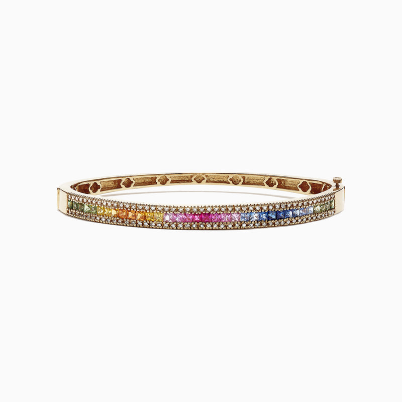The Watercolors 14K Yellow Gold Multi Sapphire & Diamond Bangle (3.60 TCW) features a vivid gradient of green, yellow, orange, pink, and blue sapphires set in gold, shown against a white background.