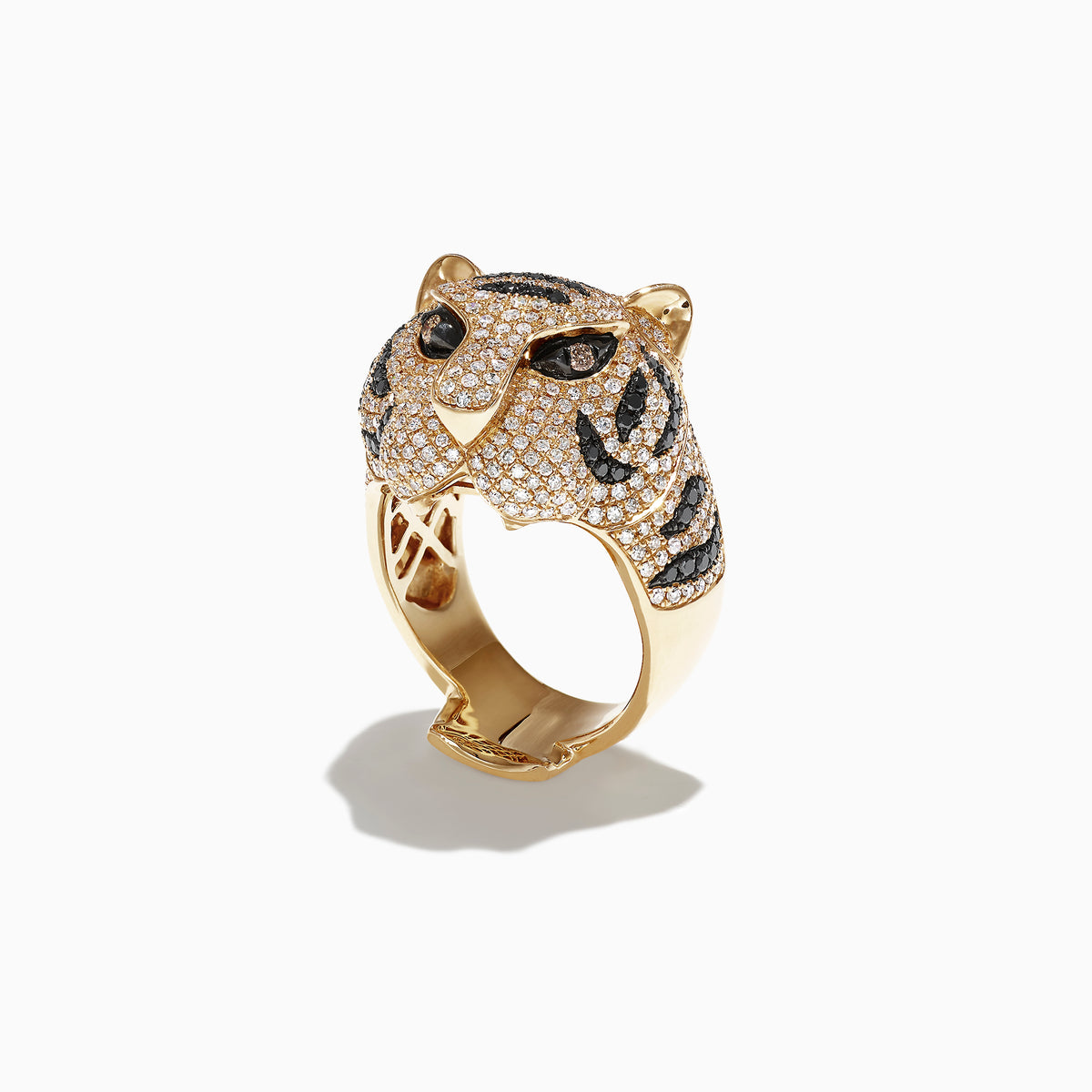 The Safari 14k Yellow Gold Black and White Diamond Tiger Ring (1.85 TCW) showcases a tiger’s head in yellow gold, detailed with black and white diamonds for the eyes and stripes, set on a white backdrop.