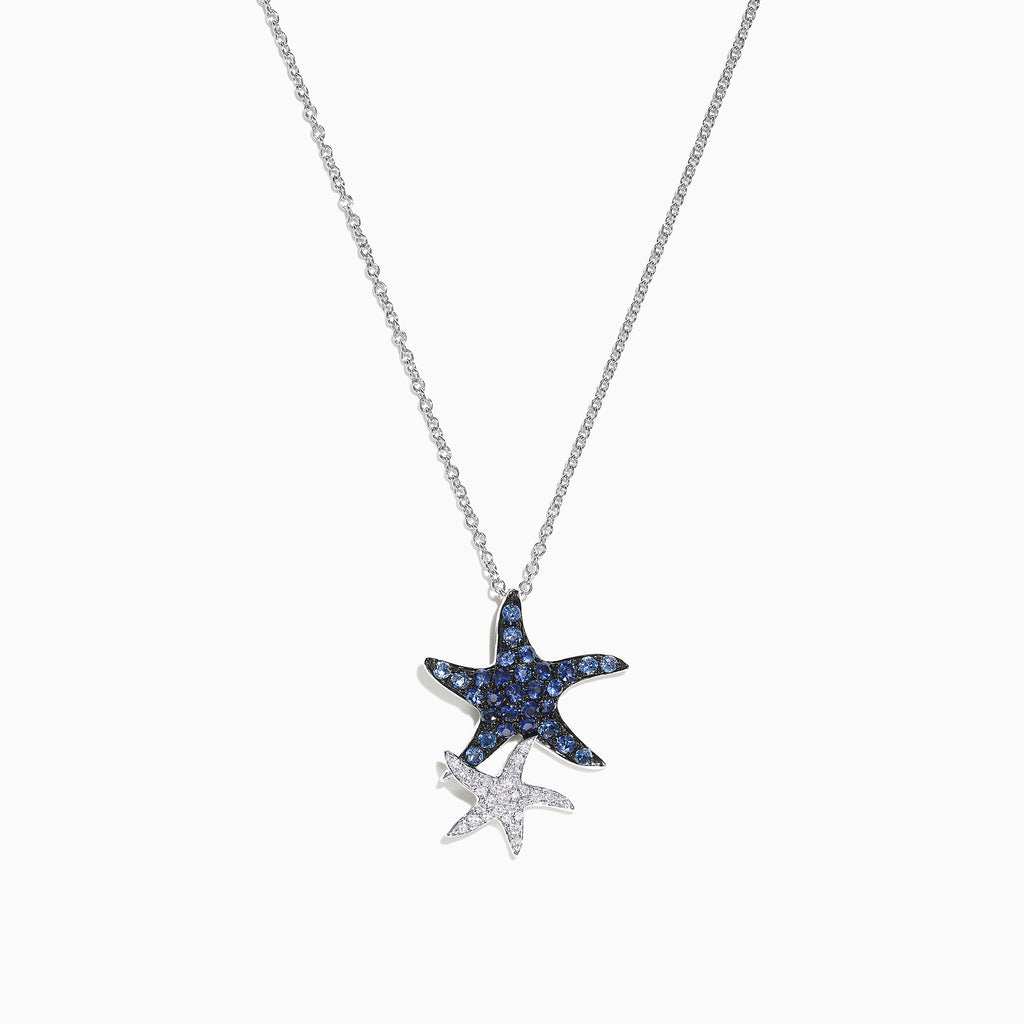 The Seaside 14K White Gold Blue Sapphire & Diamond Starfish Pendant features two starfish—one larger with blue sapphires and one smaller with diamonds—displayed against a white background.