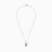 The Nahla Siri 14K White Gold Tanzanite & Diamond Pendant (1.73 TCW) features a curved design with sparkling diamonds and a striking triangular tanzanite, shown against a white background.