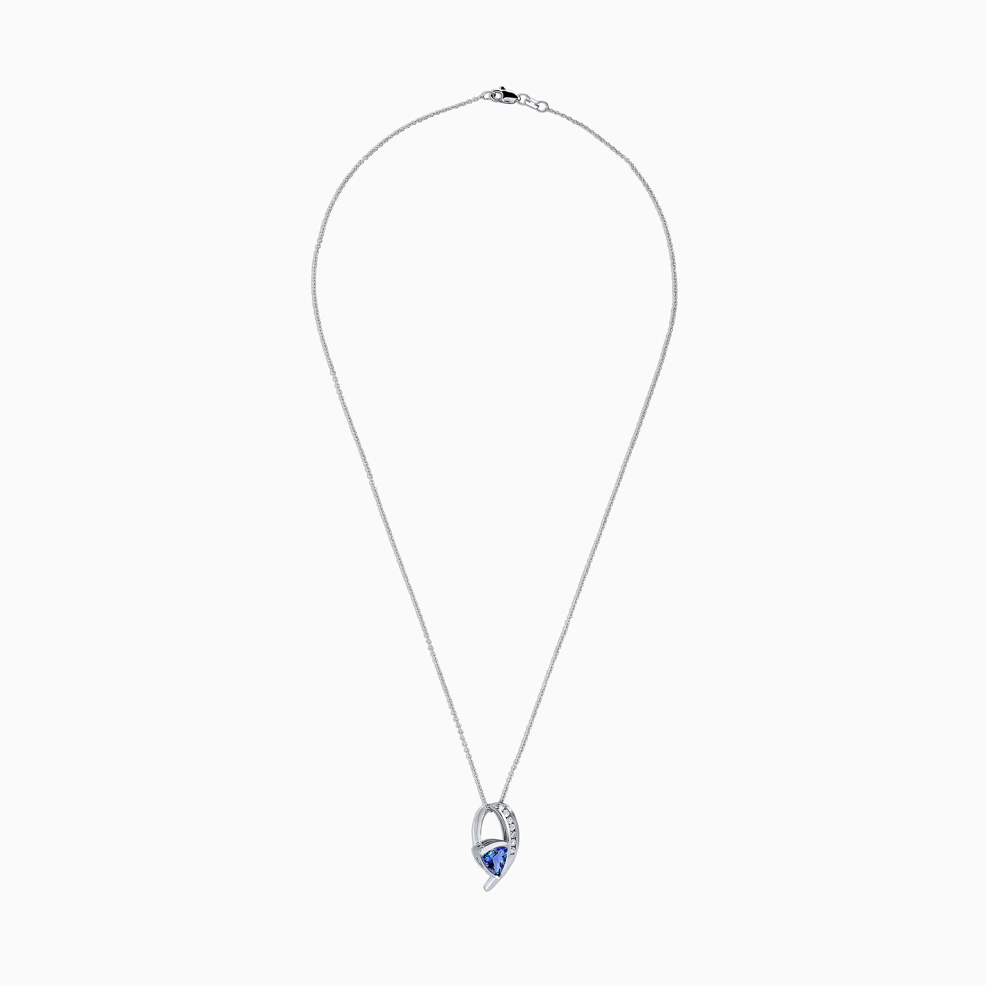 The Nahla Siri 14K White Gold Tanzanite & Diamond Pendant (1.73 TCW) features a curved design with sparkling diamonds and a striking triangular tanzanite, shown against a white background.