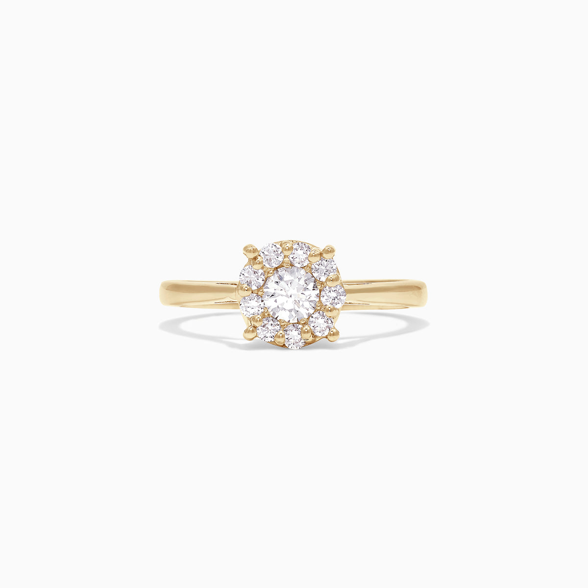 The Bouquet 14K Yellow Gold Diamond Cluster Ring, 0.51 TCW, showcases a round cluster of sparkling diamonds set in yellow gold, elegantly presented on a plain white background.