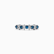 The Bella Bleu 14K White Gold Blue and White Diamond Ring, 0.58 TCW, showcases alternating round blue and white diamonds set in polished gold, beautifully displayed on a white background.