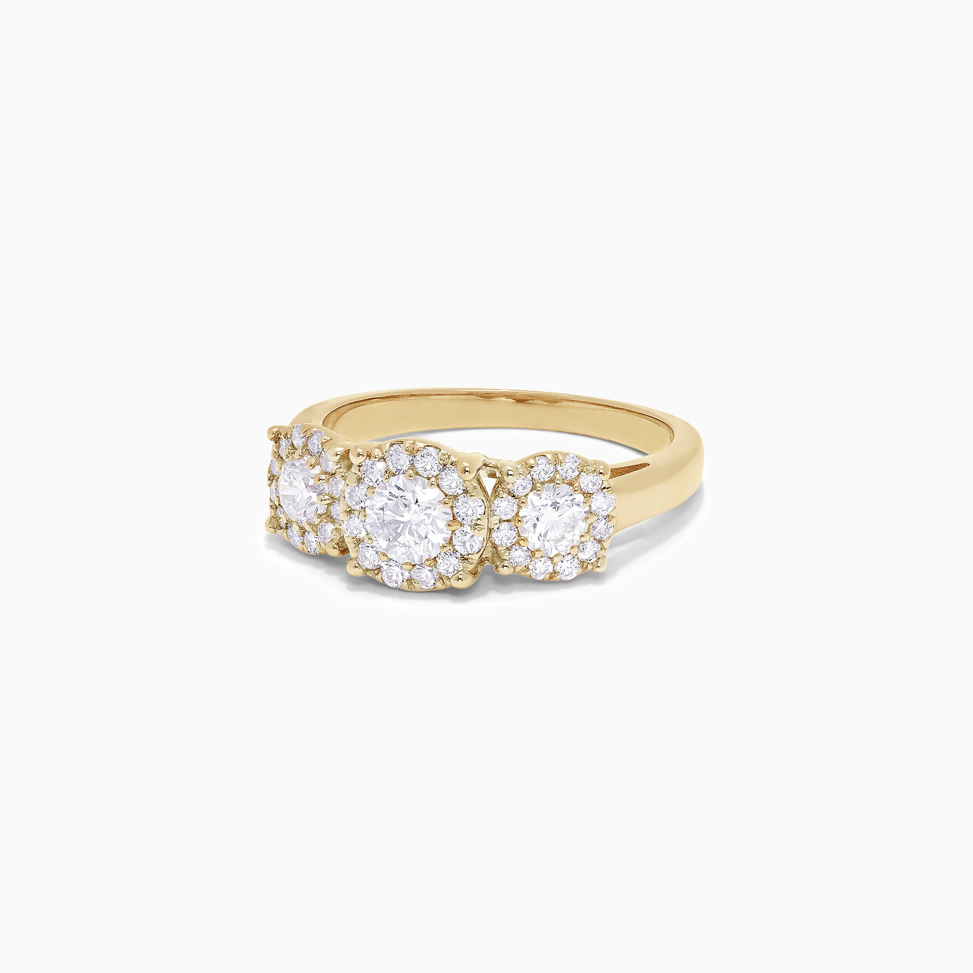 The Bouquet 14K Yellow Gold Three-Stone Diamond Halo Ring, 1.01 TCW, showcases three round diamonds with sparkling halos set in a thick gold band, displayed on a plain white background.
