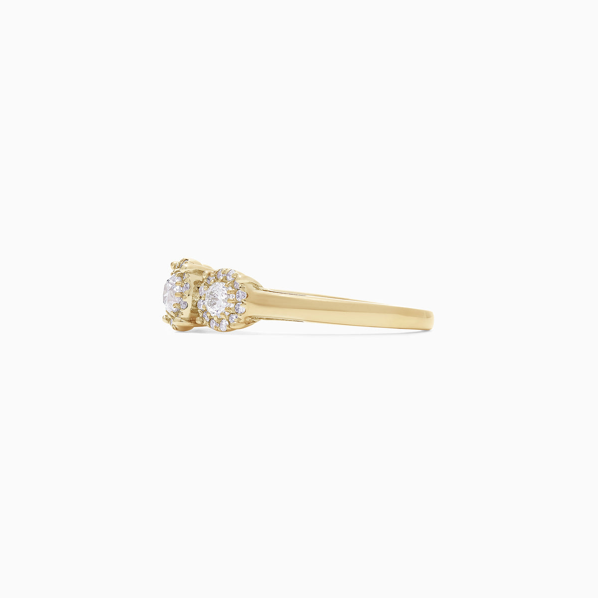 The Bouquet 14K Yellow Gold Three-Stone Diamond Halo Ring, 1.01 TCW, showcases three round diamonds with sparkling halos set in a thick gold band, displayed on a plain white background.