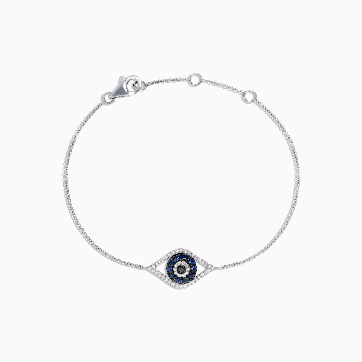 The Novelty 14K White Gold Sapphire & Diamond Evil Eye Bracelet, 0.43 TCW, features a central eye charm set with blue sapphires and diamonds on a fine chain with lobster clasp. Shown on a plain white background.