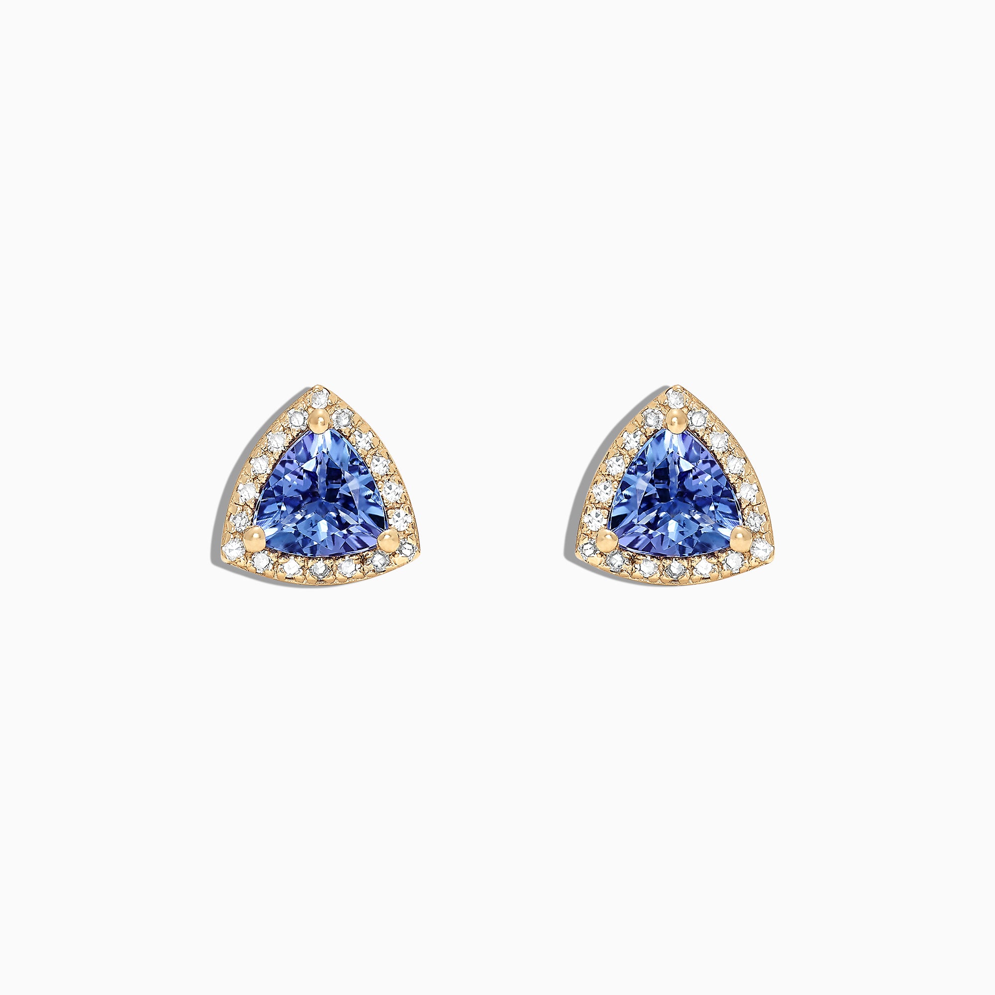 A pair of Nahla Siri 14K Yellow Gold Tanzanite and Diamond Stud Earrings, 1.19 TCW, featuring triangular blue stones surrounded by diamonds, is displayed on a white background.