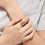 The Nahla Siri 14K Yellow Gold Tanzanite and Diamond Ring, 2.26 TCW, features five uniquely shaped blue tanzanites and shimmering round diamonds set along the multi-band design for extra sparkle.