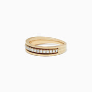 The DOro 14K Yellow Gold Diamond Band features a channel-set row of round white diamonds totaling 0.25 TCW, bordered by smooth gold bands on the top and bottom.