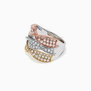 The Trio 14K Tri Color Gold Diamond Twist Ring, 1.24 TCW, features three intertwined rose, white, and yellow gold bands, each set with sparkling diamonds for a stunning look.