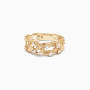 The DOro 14K Yellow Gold Diamond Ring, 0.33 TCW, features an elegant twisted rope design with a textured finish, accented by multiple sparkling white diamonds set along the band.