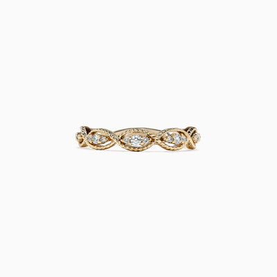 The DOro 14K Yellow Gold Diamond Ring, 0.20 TCW, features a twisted band adorned with round diamonds set in marquise-shaped bezels along the entire band.