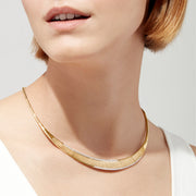 The DOro 14K Brushed Yellow Gold Diamond Collar Necklace, 0.90 TCW, showcases a segmented geometric design accented by a row of sparkling diamonds along the lower front.