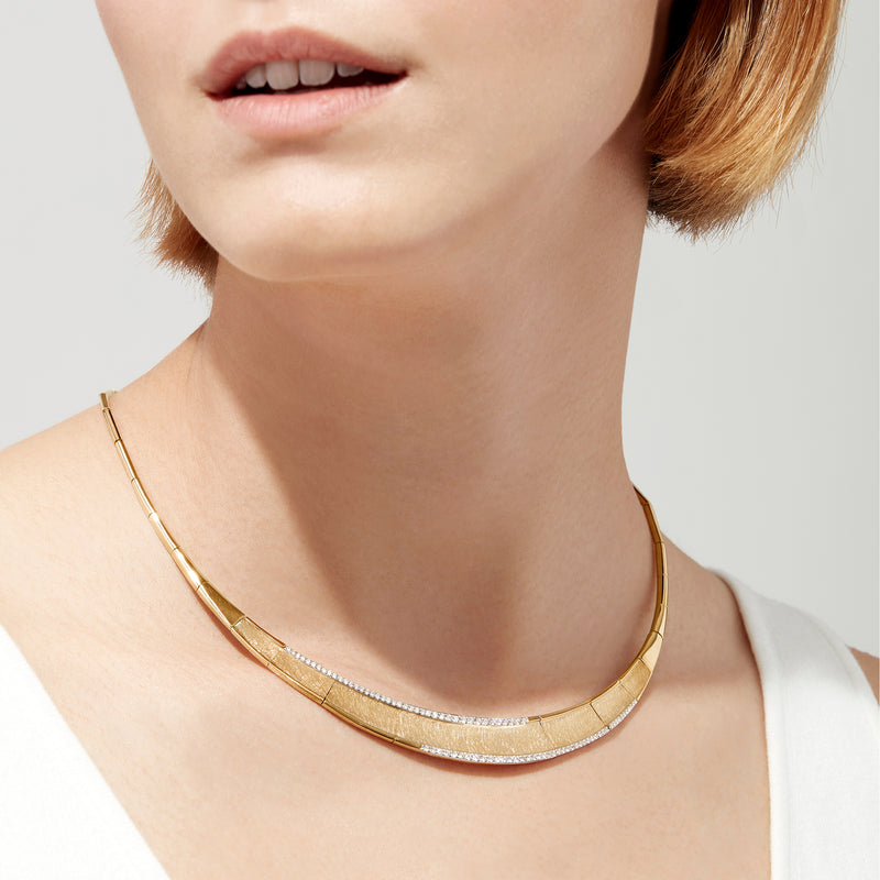The DOro 14K Brushed Yellow Gold Diamond Collar Necklace, 0.90 TCW, showcases a segmented geometric design accented by a row of sparkling diamonds along the lower front.