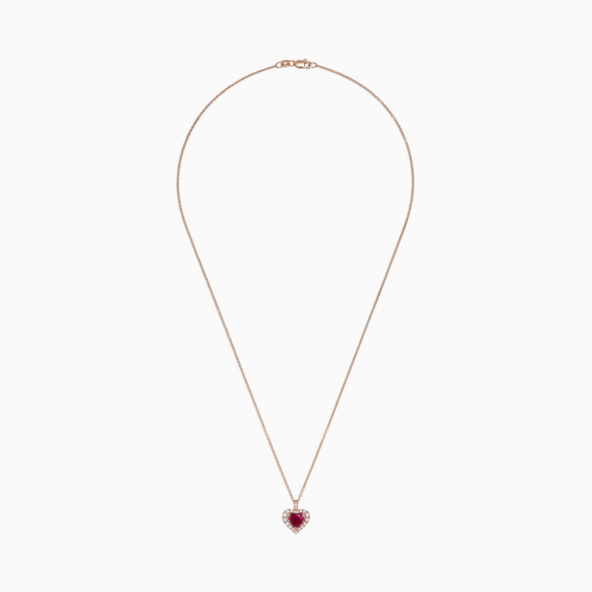 The Ruby Royale 14K Rose Gold Heart Shaped Ruby Pendant (1.28 TCW) features a romantic ruby centerpiece, accented by sparkling diamonds on a delicate rose gold chain for an elegant touch.