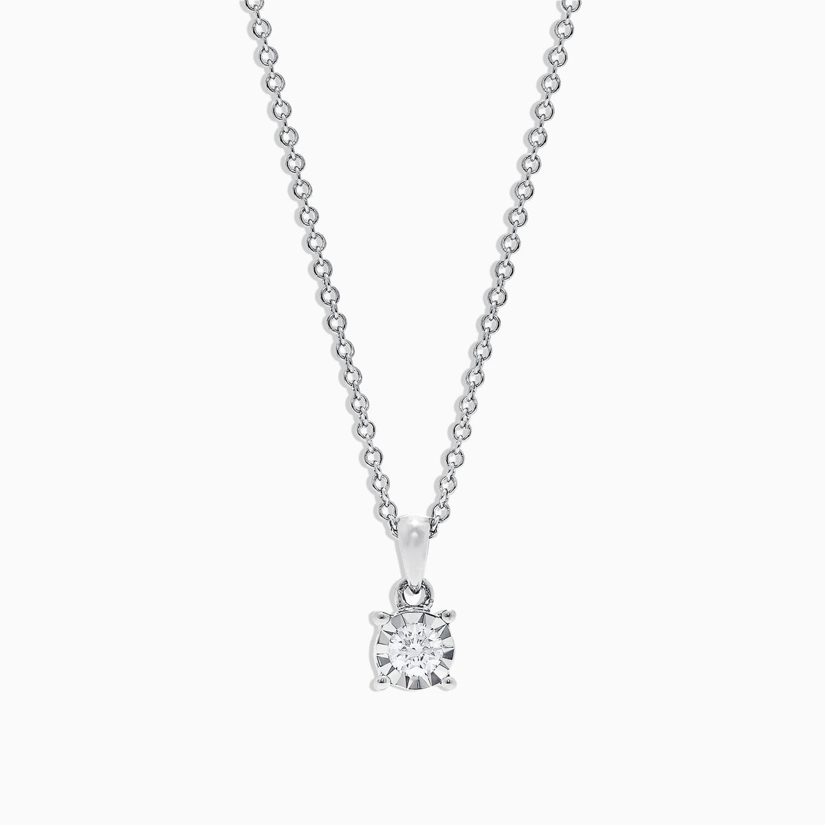 The Pave Classica 14K White Gold Diamond Solitaire Pendant features a single 0.15 TCW diamond in a simple prong setting, suspended from a delicate chain.