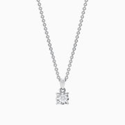 The Pave Classica 14K White Gold Diamond Solitaire Pendant features a single 0.15 TCW diamond in a simple prong setting, suspended from a delicate chain.