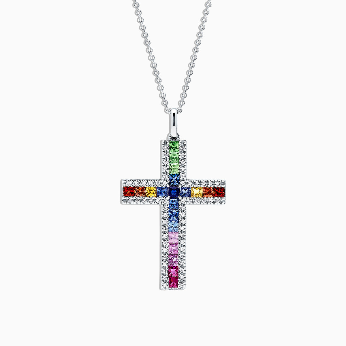 A 14K gold cross pendant, named Watercolors, features multi-colored sapphires and diamonds totaling 2.63 TCW, arranged in a vibrant grid pattern of blue, red, green, orange, and pink stones.