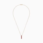 The Ruby Royale 14K Yellow Gold Pendant features a vertical rectangular design with princess cut rubies (1.17 TCW) set in the center, bordered by white diamonds, on a gold chain necklace.