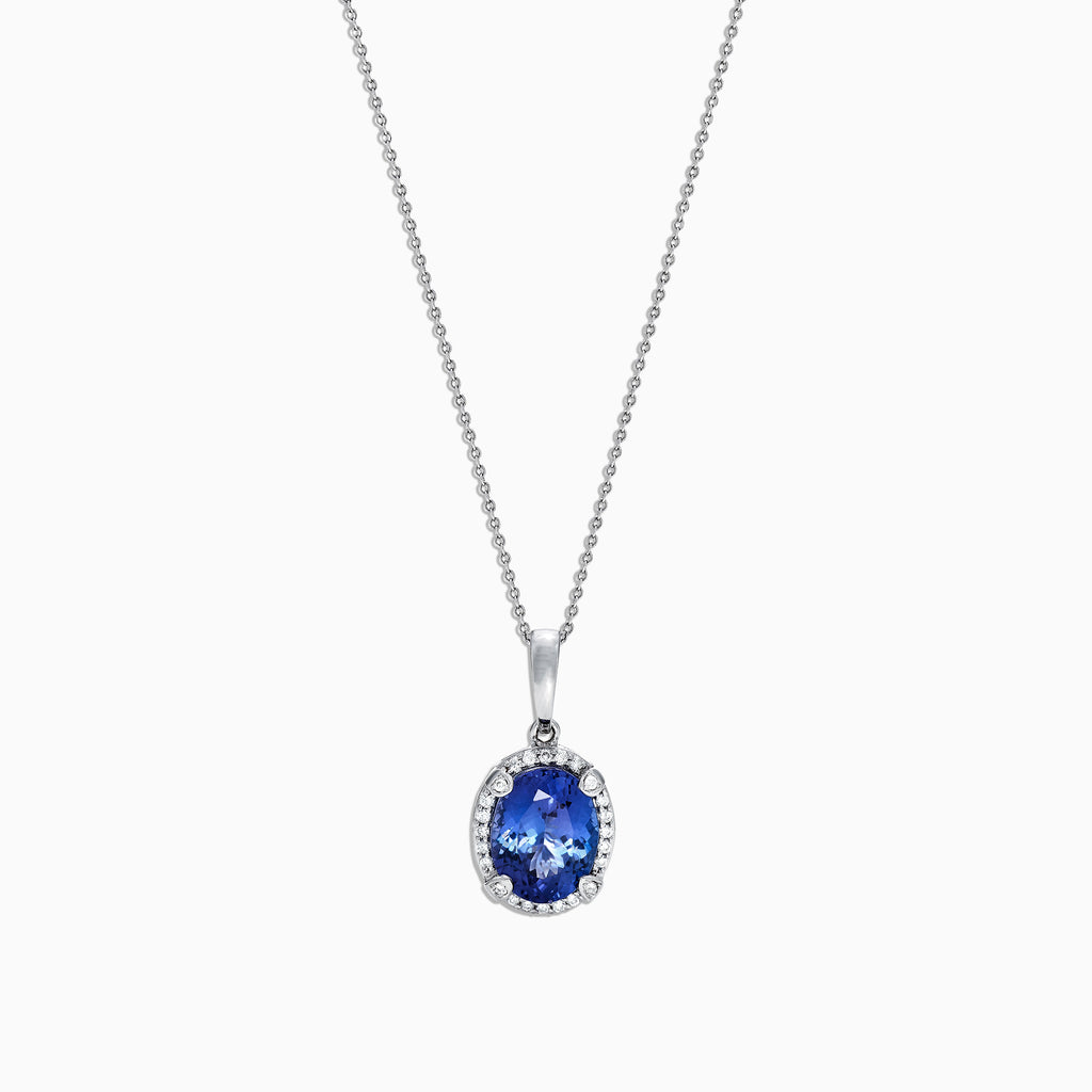 The Nahla Siri 14K White Gold Pendant features a 2.97 TCW tanzanite surrounded by sparkling diamonds, offering elegance and brilliance.