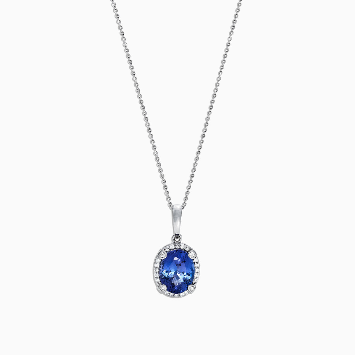 The Nahla Siri 14K White Gold Pendant features a 2.97 TCW tanzanite surrounded by sparkling diamonds, offering elegance and brilliance.