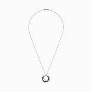 A 14K white gold necklace showcases a pendant of two interlocking circles—one with blue sapphires, the other with diamonds (0.74 TCW)—suspended from a delicate chain on a white background.