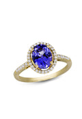 The 14K Yellow Gold Tanzanite and Diamond Ring, 2.24 TCW, features an oval-cut blue tanzanite center stone surrounded by a halo of white diamonds and additional diamonds along the band.