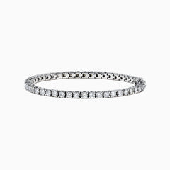A 14K White Gold Diamond Tennis Bracelet, 6.50 TCW, featuring a continuous row of round sparkling diamonds set in prongs, displayed on a plain white background.